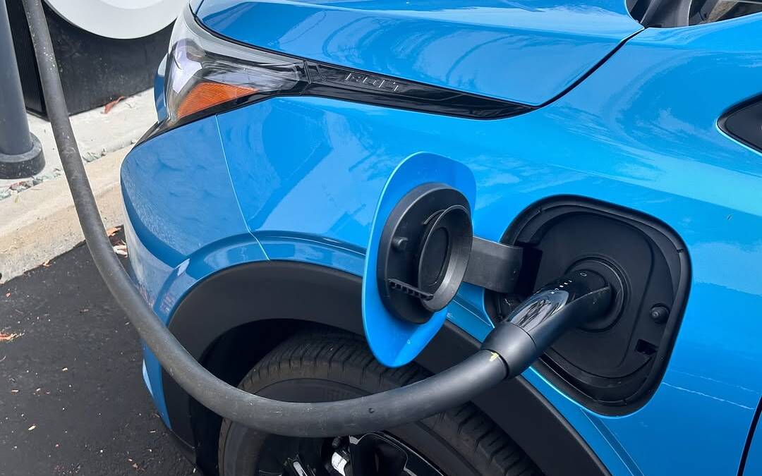 The upcoming Chevrolet Bolt appears on the road ahead of its unveiling